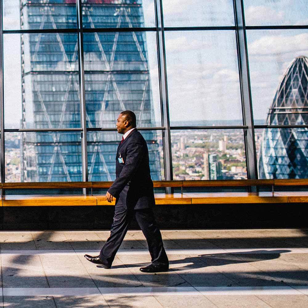 APEX businessman walking